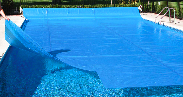 a solar cover helps extend your pool season